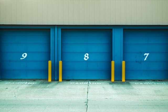 Three blue doors to storage units