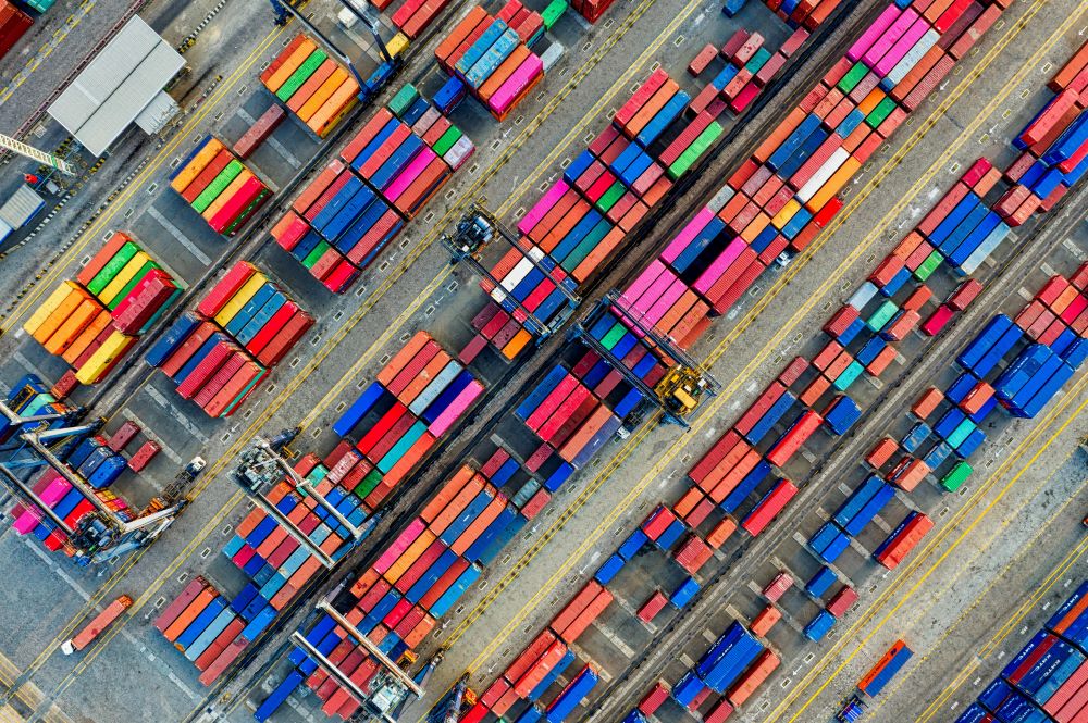 Colorful containers being stored on a ship